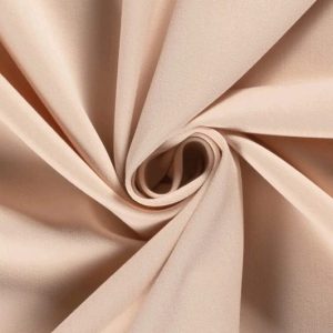 Gabardine stof, effen zalm roze. NC237