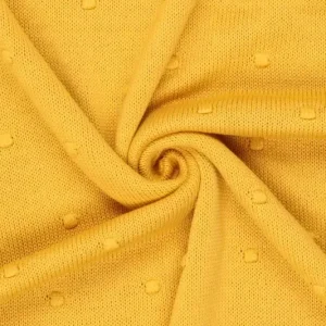 Gebreide stof, stippen, okergeel. Y476