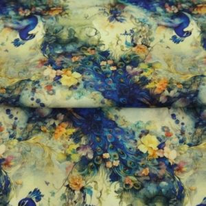 Stenzo tricot katoen stof, pauwprint, geel/paars/blauw. X1157