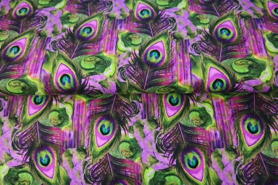 Stenzo tricot katoen stof, pauwveer print, groen/paars. X1344
