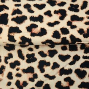 Stenzo viscose linnen stof, panterprint, crème/zwart/oranje. Y524