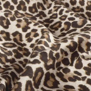 Tricot katoen stof, digitale panterprint, zand/camel/zwart. P108