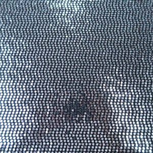 Tricot stof, zilveren pailletten, zwart. F5401-7