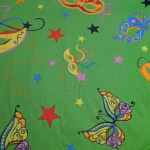 Katoen stof groen met maskers print, M056