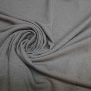 Tricot melange stof, cognac bruin. TM1054